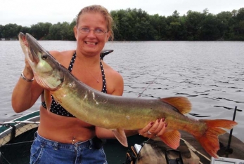 Lynn got her first muskie on Holcombe August 2010! She caught it on one of the baits that Woelper!